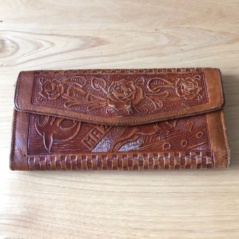 Vintage carved leather wallet